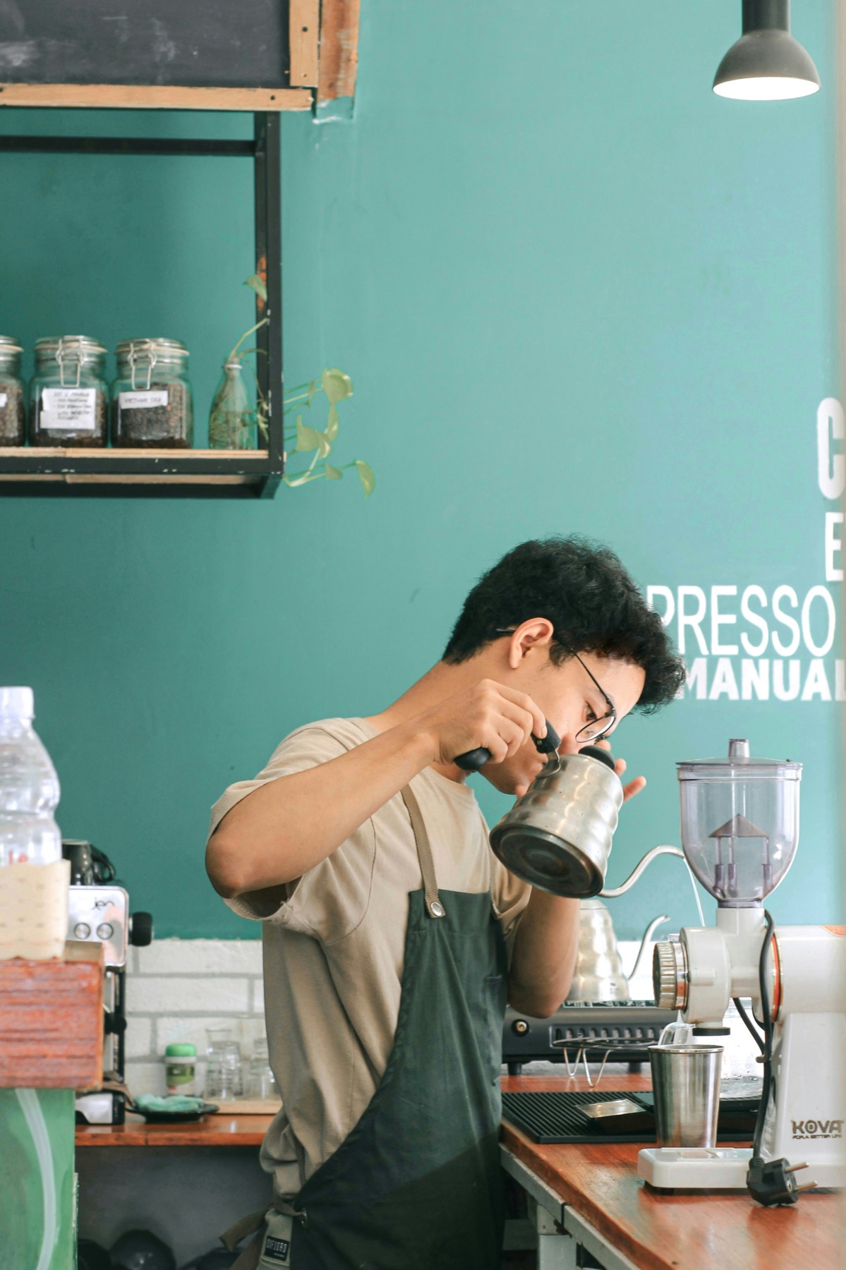 A barista making coffee